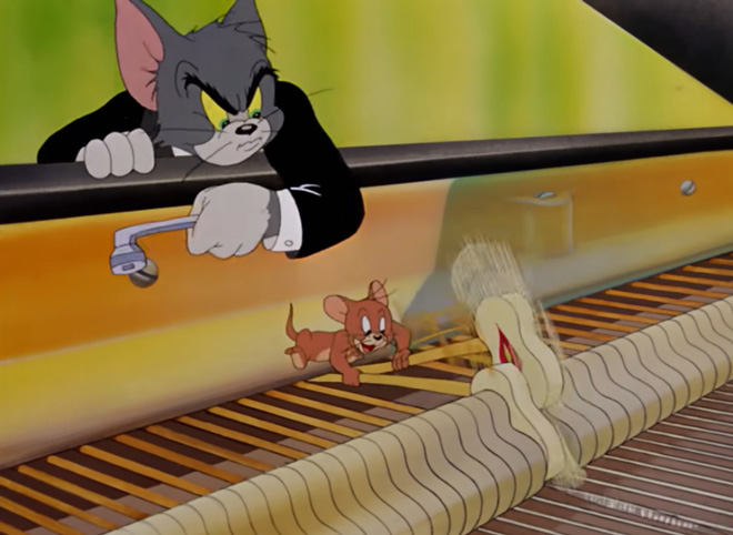 汤姆用扳手攻击捣乱的杰瑞